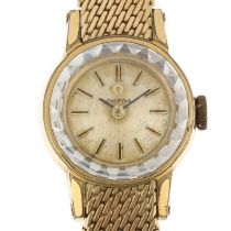 OMEGA - a lady's gold plated mechanical bracelet watch, ref. 511.166, circa 1965, silvered dial with