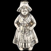 A heavy gauge German novelty silver figural 'Dutch Girl' pepperette, maker MU?, 8cm, 1.8oz No damage