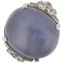 An exceptional Art Deco lavender star sapphire and diamond ring, circa 1930, centrally claw set with