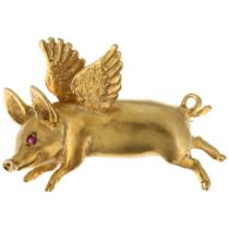 A modern 9ct gold figural flying pig brooch, maker HG, London 2004, realistically formed with ruby
