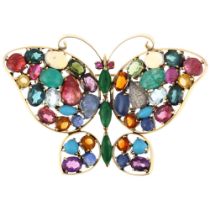 A large 14ct gold gem set figural butterfly brooch, gemstones include jade, opal, ruby, sapphire,
