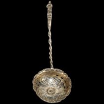 A Victorian silver Apostle tea strainer/sifter spoon, Charles Edwards, London 1880, 16cm, 0.8oz Bowl