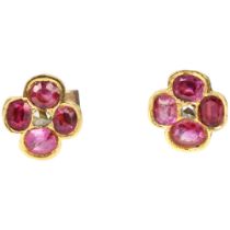A pair of Antique ruby and diamond quatrefoil earrings, set with oval-cut rubies and rose-cut