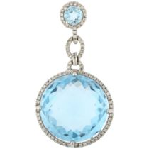 A modern 14ct white gold aquamarine and diamond cable drop pendant, maker RJM, claw set with round