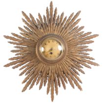 A Vintage gilded sunburst wall clock with quartz movement, 50cm overall