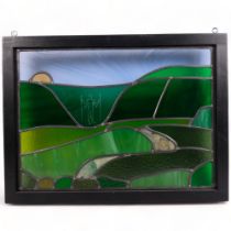 A modern coloured leadlight glass panel, depicting the Long Man of Wilmington, 47cm x 63cm