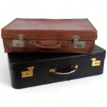 An early 20th century crocodile skin vanity case, with English lever locks, W56cm, and another (2)