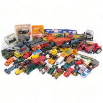 A box of various diecast vehicles, including Matchbox and Dinky