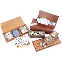 Carved wood box with dominos and playing cards, 28cm across, 4 other games boxes and contents, etc