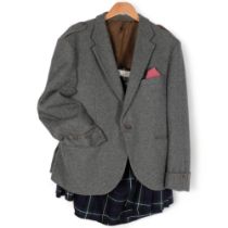 A woollen Scottish suit jacket, no size, and a pure woollen tartan kilt, from the Tartan Gift Shops,