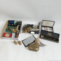 A box of items, including cutlery, costume jewellery, bell, horn, cigarette case, etc