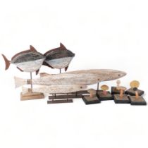 3 carved wood fish on metal stands, largest 60cm, 2 coloured fish, and toadstools on stands
