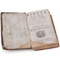 A 18th century leather-bound Bible (Biblia Sacra Vulgat additions Sizti V dated 1716)