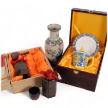 A Chinese framed calligraphy brush set, reproduction crackle glaze vase, a sacer boxed cup and