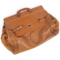 A light tan brown leather holdall, with interwoven stitched monogram, bag length 46cm, depth 31cm,