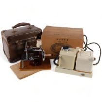 A boxed Pifco electric teamaker, and a child's sewing machine in case