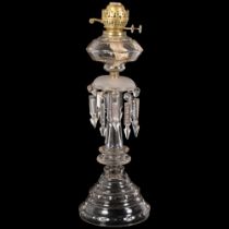 An Antique oak oil lamp, with panelled glass font and arrowhead lustre drops, H56cm Lamp is in