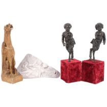 Pair of bronze Pan figures on plinths, 37cm, a painted plaster wall hanging mythical beast, chip