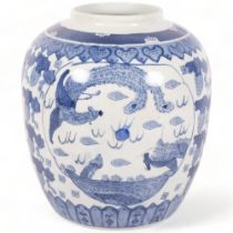 A large blue and white Chinese ginger jar, with transfer printed dragon or mythical creature