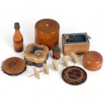 A group of treen items, to include marquetry decorated pin disc, a Mauchline Ware pin disc, pin