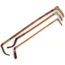 A group of 3 early 20th century bamboo and horn-handled riding crops, 1 with leather mount,