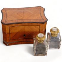 A 19th century French kingwood perfume box, of serpentine form, with satinwood inlaid decoration,