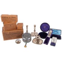 A pair of candlesticks, 11cm, chamber stick, Smiths clock, and empty boxes