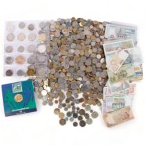 A box of foreign coins, a sleeve of commemorative coins, banknotes, and a World Cup 2003 Rugby