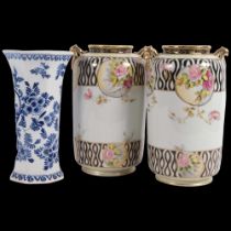 A pair of hand painted Japanese vases, lovely gilded decoration with various hand painted rose