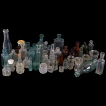 A crate full of various Vintage and Antique bottles, many Apothecary style in nature