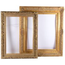 2 large modern embossed gilt frames, largest 86cm x 74cm, and 59cm x 50m internal, the smaller one