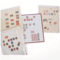 An album of British and worldwide stamps, including Penny Reds, One Penny Purples, Edward VII Half