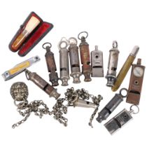 A collection of Vintage Boy Scouts whistles, cigarette holder etc