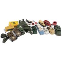 A box of Dinky Toy military vehicles