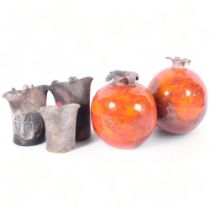 Anna Keller, 2 glazed pottery pomegranates, tallest 22cm, and 3 angel sculptures by the same artist