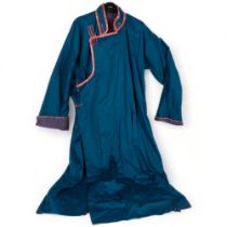 A traditional Mongolian Del, ceremonial attire, vibrant turquoise colour, with embroidered floral