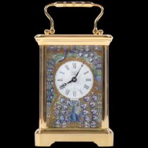 A Halcyon Days brass carriage clock, with white enamelled and coloured enamel panels decorated