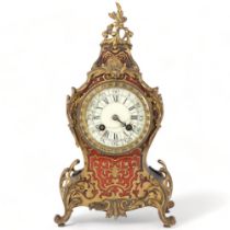 A 19th century French boulle work 8-day mantel clock, with drum movement striking on a gong,