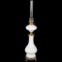 An Art Nouveau brass and white ceramic oil lamp, H80cm General surface scratches and marks to the