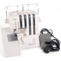 A Brother Lock 760 DE electronic overlock sewing machine, with associated peddle and plugs