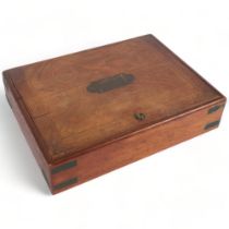 A Victorian Arts and Crafts oak brass-bound sewing box, with sectional fitted interior and