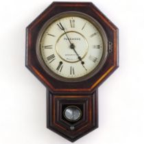 A wooden-cased drop-dial American wall clock, 8-day movement, clock face reads "Passmore,