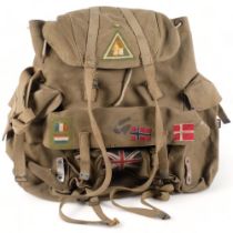 An Army rucksack with applied flags