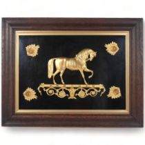 A 19th century gilt-bronze relief of the circus horse, Ducrow, with floral bosses, oak framed and