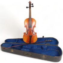 A full-sized violin, back measures 14", label to the inside reads Antonius Stradivarius Cremonenfis,