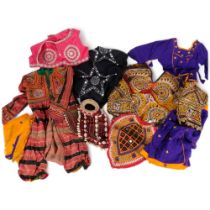 A quantity of traditional Mongolian attire, a selection of hand and machine sewn garments,