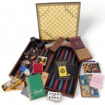 An early 20th century walnut game compendium, with what appears original associated contents, case