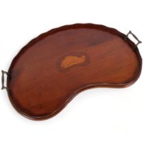 An Antique mahogany kidney-shaped 2-handled tray, with inlaid conch shell decoration, L57cm