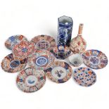 A quantity of Antique Oriental plates and bowls, various Imari design, largest plate diameter