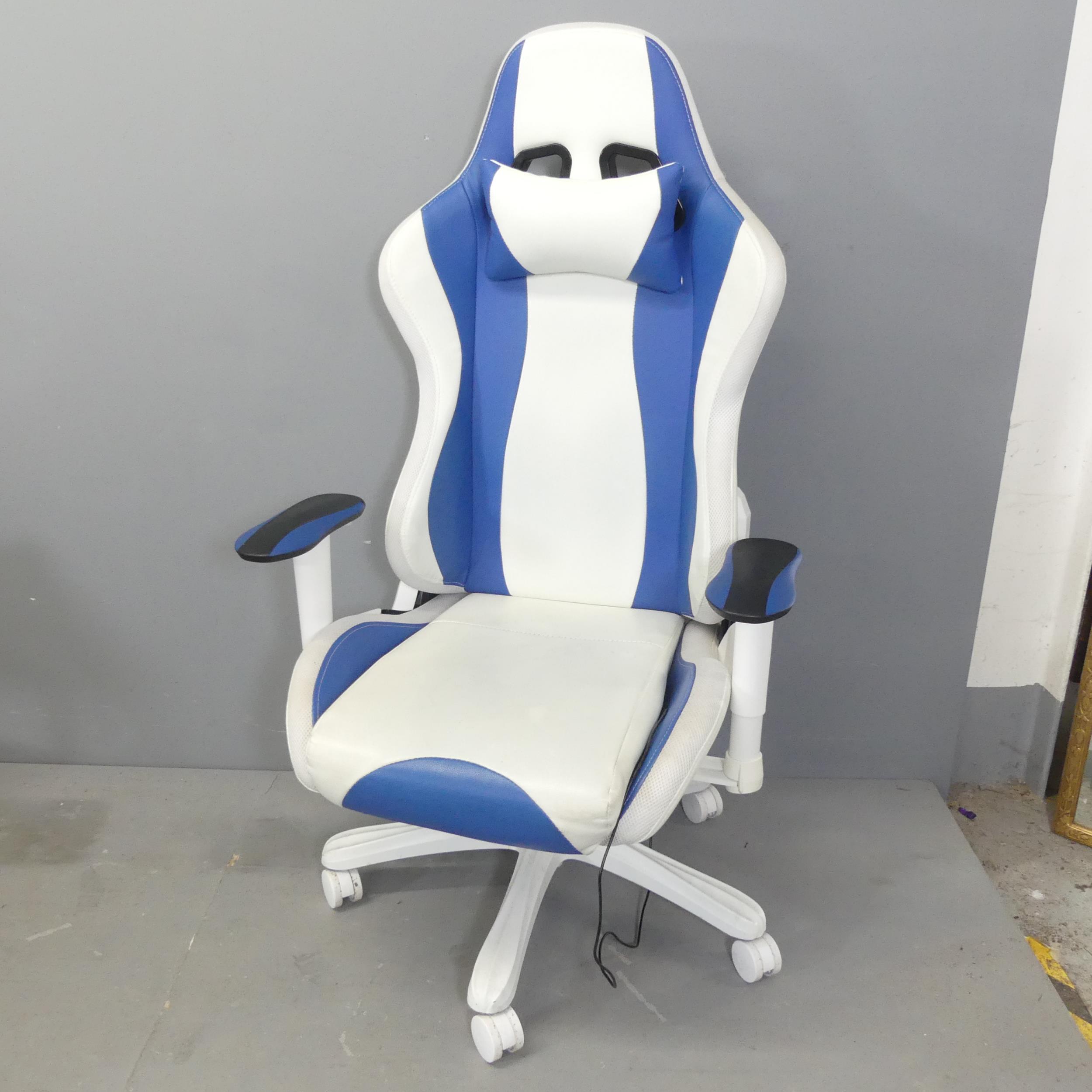 A contemporary gaming chair, with LED lighting and swivel and rise and fall mechanisms. Some marks
